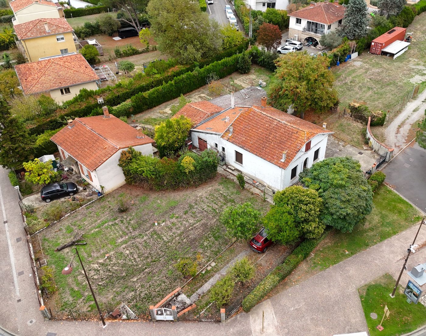 Oblique aerial view of a house and lot